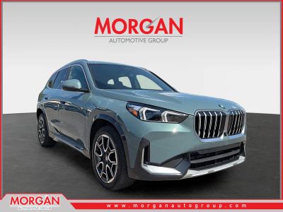 2026 BMW X1 xDrive28i in Cape York Green Metallic — front three-quarter view