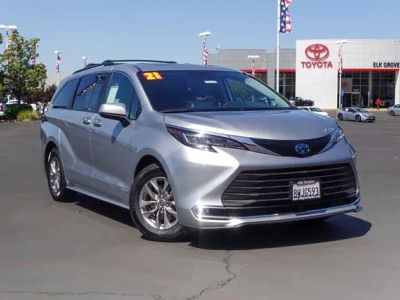 2021 Toyota Sienna XLE in Silver — front three-quarter view