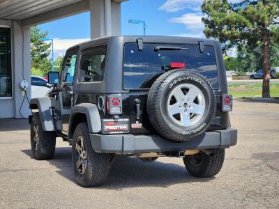 2012 Jeep Wrangler — rear three-quarter view