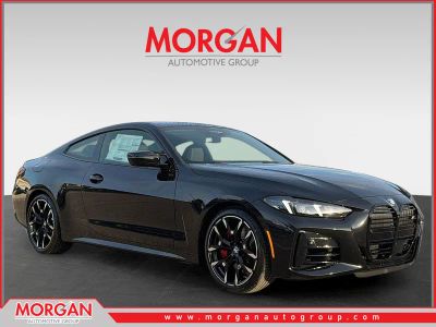 2026 BMW 4 Series M440i in Black Sapphire Metallic — front three-quarter view