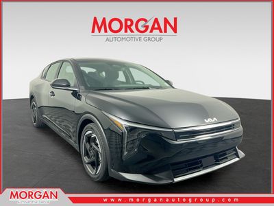 2025 Kia K4 EX in Aurora Black Pearl — front three-quarter view