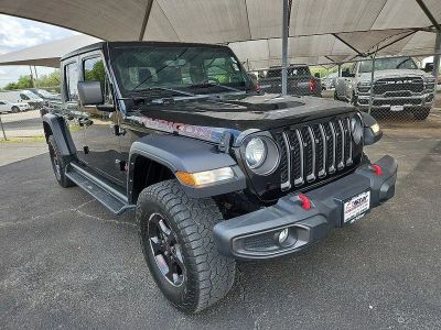 2022 Jeep Gladiator Rubicon in Black Clearcoat — front three-quarter view