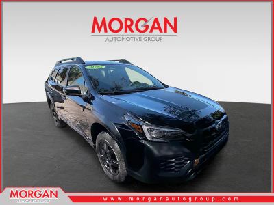2024 Subaru Outback Wilderness in Crystal Black Silica — front three-quarter view