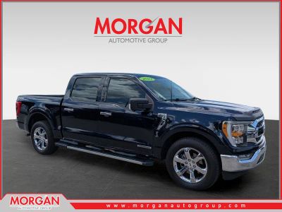 2021 Ford F-150 XLT in Antimatter Blue Metallic — front three-quarter view