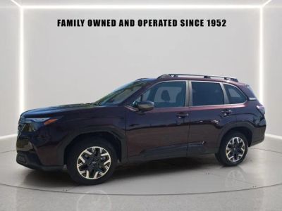 2026 Subaru Forester Premium in Dark Mahogany Pearl — front three-quarter view