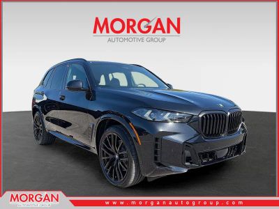 2026 BMW X5 sDrive40i in Black Sapphire Metallic — front three-quarter view