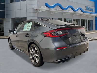 2026 Honda Civic Hatchback Hybrid — rear three-quarter view