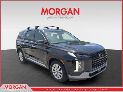 2023 Hyundai Palisade SEL in Abyss Black Pearl — front three-quarter view