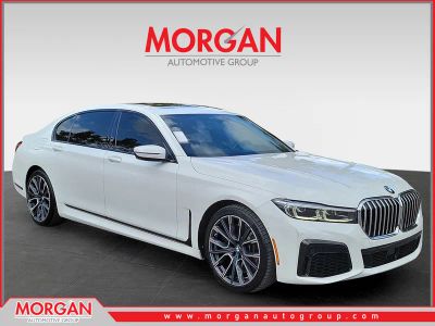 2022 BMW 7 Series 750i xDrive in Alpine White — front three-quarter view