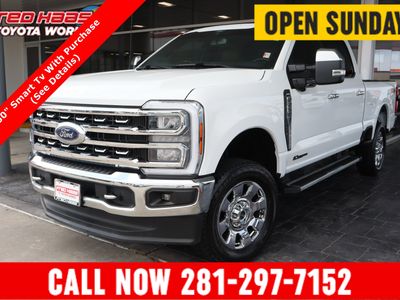 2024 Ford Super Duty F-250 4WD LARIAT 6.7T Diesel in Oxford White — front three-quarter view