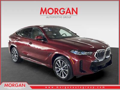 2025 BMW X6 xDrive40i in Red — front three-quarter view