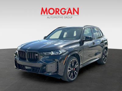 2026 BMW X5 — rear three-quarter view