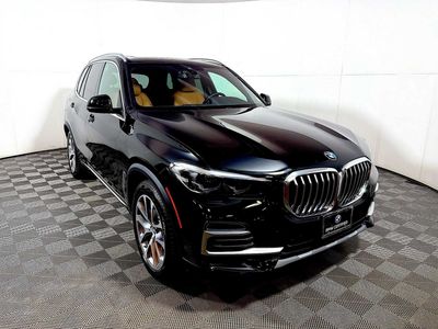 2023 BMW X5 xDrive40i xDrive40i in Jet Black — front three-quarter view