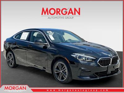 2024 BMW 2 Series 228i in Jet Black — front three-quarter view