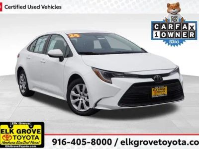 2024 Toyota Corolla LE in White — front three-quarter view