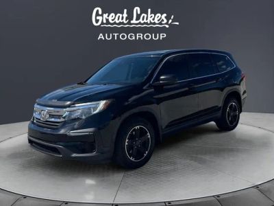 2019 Honda Pilot LX in Crystal Black Pearl — front three-quarter view