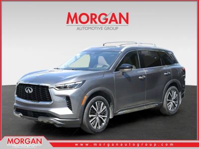 2023 INFINITI QX60 SENSORY in Graphite Shadow — front three-quarter view