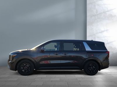 2026 Kia Carnival — rear three-quarter view