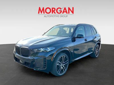 2026 BMW X5 — rear three-quarter view