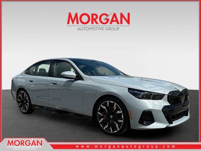 2026 BMW 5 Series 540i xDrive in Brooklyn Grey Metallic — front three-quarter view