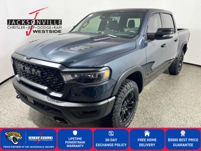 2026 RAM 1500 Rebel in Forged Blue Metallic Exterior Paint — front three-quarter view