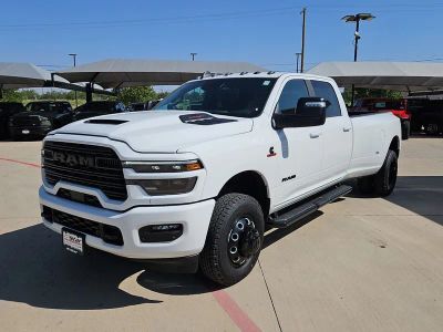 2026 RAM 3500 Laramie in Bright White Clearcoat — front three-quarter view