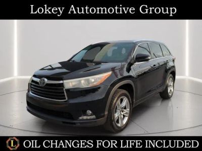 2016 Toyota Highlander Limited Platinum V6 in Midnight Black Metallic — front three-quarter view
