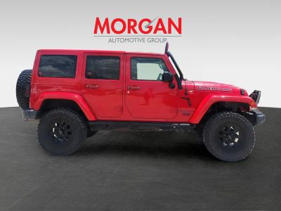 2016 Jeep Wrangler Unlimited — rear three-quarter view