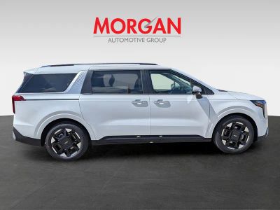 2026 Kia Carnival — rear three-quarter view