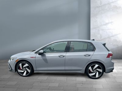 2024 Volkswagen Golf GTI — rear three-quarter view