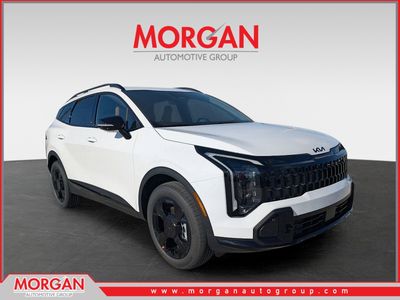 2026 Kia Sportage X-Line in Glacial White Pearl — front three-quarter view