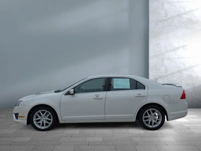 2011 Ford Fusion — rear three-quarter view