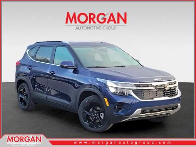 2026 Kia Seltos EX in Blue — front three-quarter view