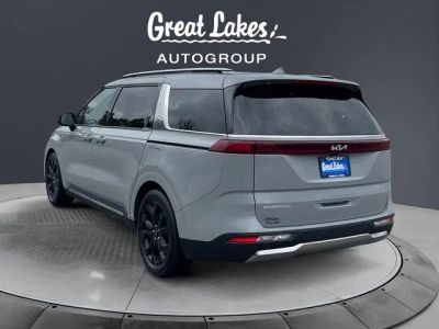 2023 Kia Carnival — rear three-quarter view