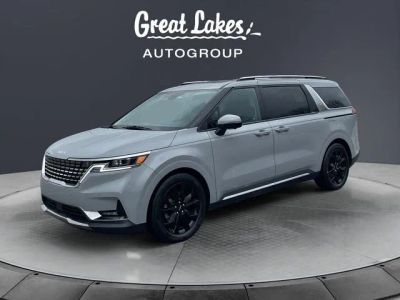 2023 Kia Carnival SX Prestige in Silky Silver — front three-quarter view