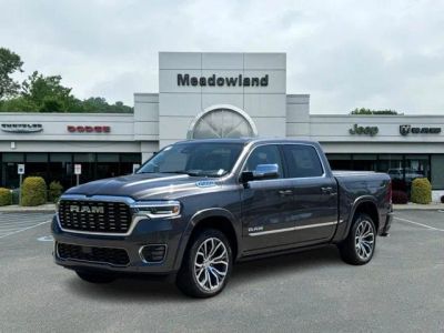 2026 RAM 1500 Tungsten in Granite Crystal Metallic Clear-Coat Exterior Paint — front three-quarter view