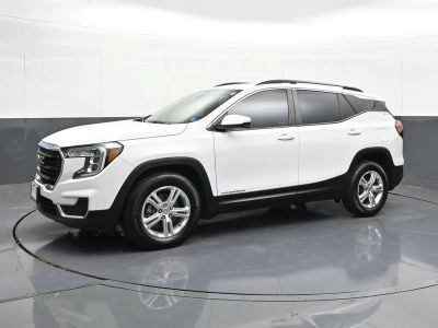 2024 GMC Terrain SLE in Summit White — front three-quarter view