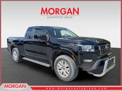 2022 Nissan Frontier SV in Black — front three-quarter view