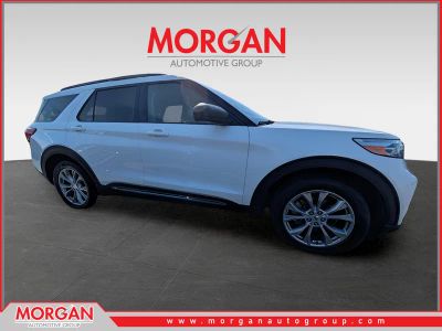 2021 Ford Explorer XLT in White Metallic — front three-quarter view