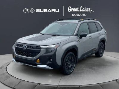 2026 Subaru FORESTER Wilderness in River Rock Pearl — front three-quarter view