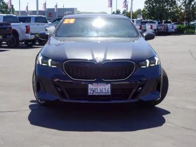2024 BMW 5 Series — rear three-quarter view