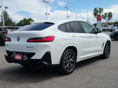 2025 BMW X4 — rear three-quarter view