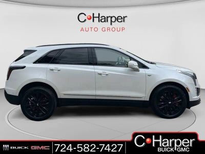 2024 Cadillac XT5 Sport in Crystal White Tricoat — front three-quarter view
