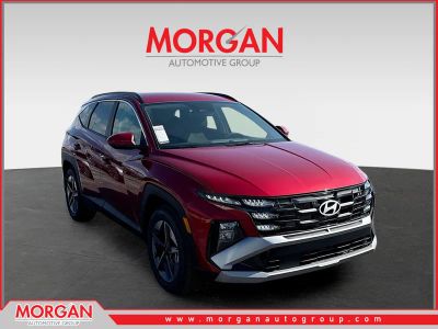 2026 Hyundai TUCSON SEL in Ultimate Red — front three-quarter view