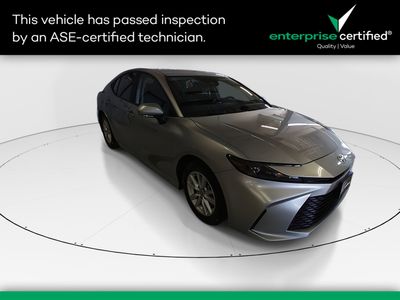 2025 Toyota Camry LE — front three-quarter view