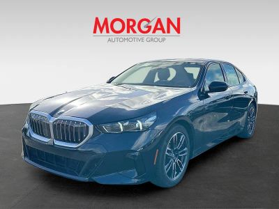 2026 BMW 5 Series — rear three-quarter view