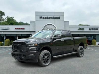 2026 RAM 2500 Big Horn in Diamond Black Crystal Pearl-Coat Exterior Paint — front three-quarter view