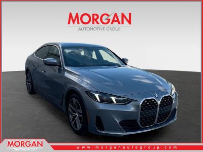 2025 BMW 4 Series 430i xDrive in Gray Metallic — front three-quarter view
