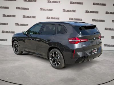 2026 BMW X3 — rear three-quarter view