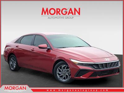 2024 Hyundai Elantra Hybrid Blue in Red — front three-quarter view
